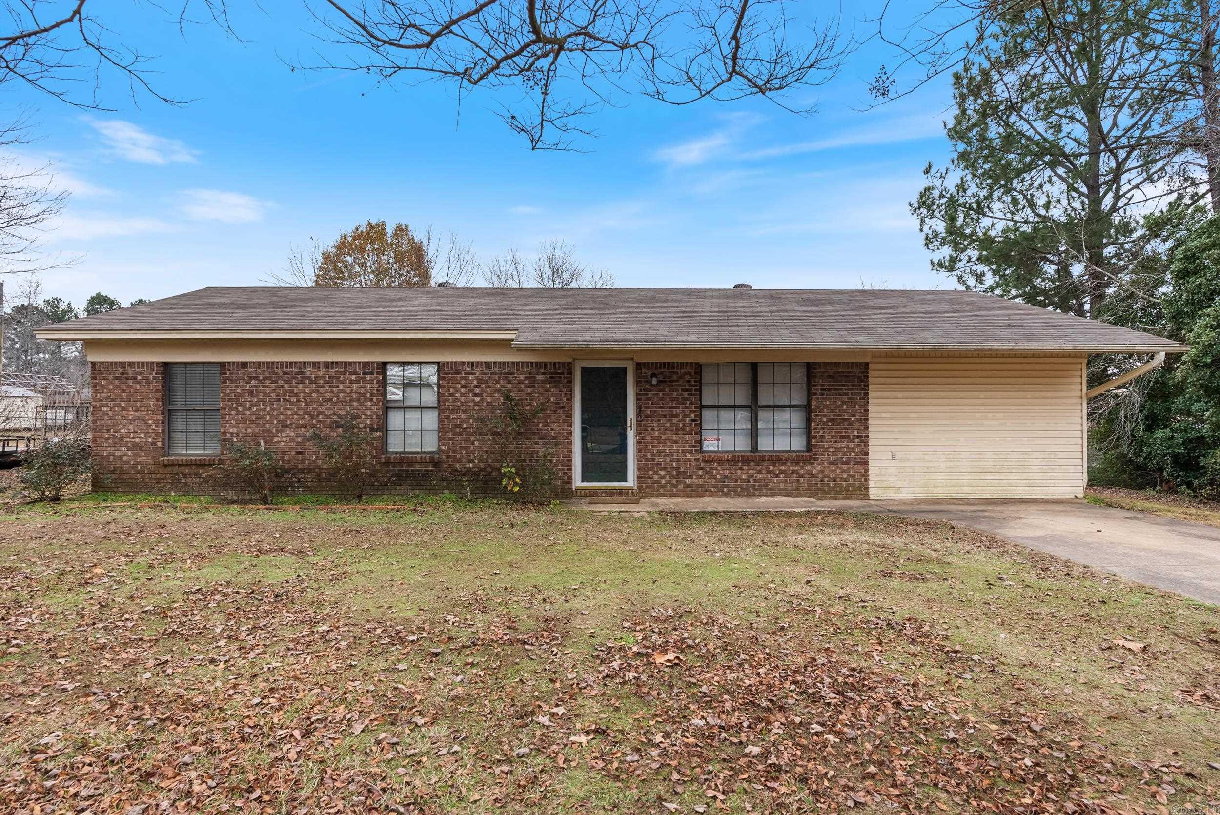 This 3-bedroom, 1.5-bath home in the Greenbrier School District boasts an extra-large living room and a spacious, flat yard perfect for outdoor activities. Conveniently located near schools and amenities, it includes a washer, dryer, and refrigerator that convey with the property. Being sold "as is," this home is ready for your personal touch to make it your own!