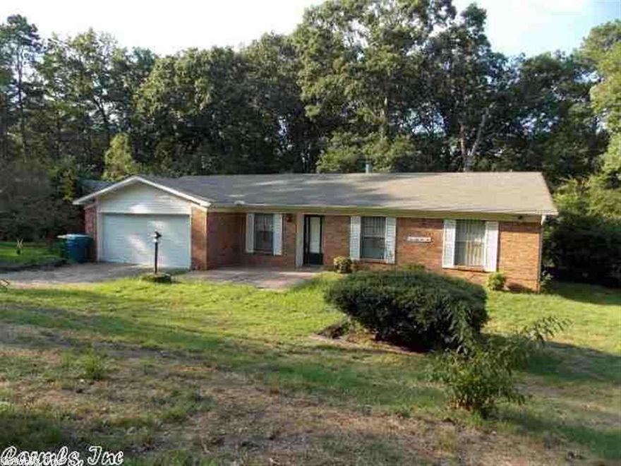 Great home at a great price! This 3BR/2BA beauty is perfect for those wanting to live the “American Dream”.  It is more affordable to own this home than most rental rates. Features include newer carpet ('09), newer master bath remodel ('09), newer tile in kitchen ('11), newer roof ('09), brand new laminate flooring, woodburning FP, deck, 2 car garage, formal living room, guttering, and 4 sided brick exterior. Too many features to list! Owner has taken great care of the home. Make your appointment today!