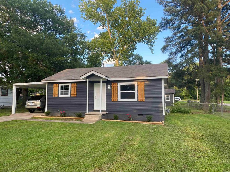 Don't miss seeing this updated charming cottage on a beautiful corner lot. Updates include new kitchen with granite counter tops, new gas range, dishwasher, flooring, tile bath with walk-in shower, 2 bedrooms, each bedroom has double closets, tile flooring in laundry room, fresh paint, windows, roof, HVAC, Water heater, lighting, hardware.  This is a rare find and a must see. Located just blocks from the new elementry school and conveniently located to shopping, easy commute to North Little Rock or Little Rock, Airforce Base, Jacksonville, Lonoke Co.