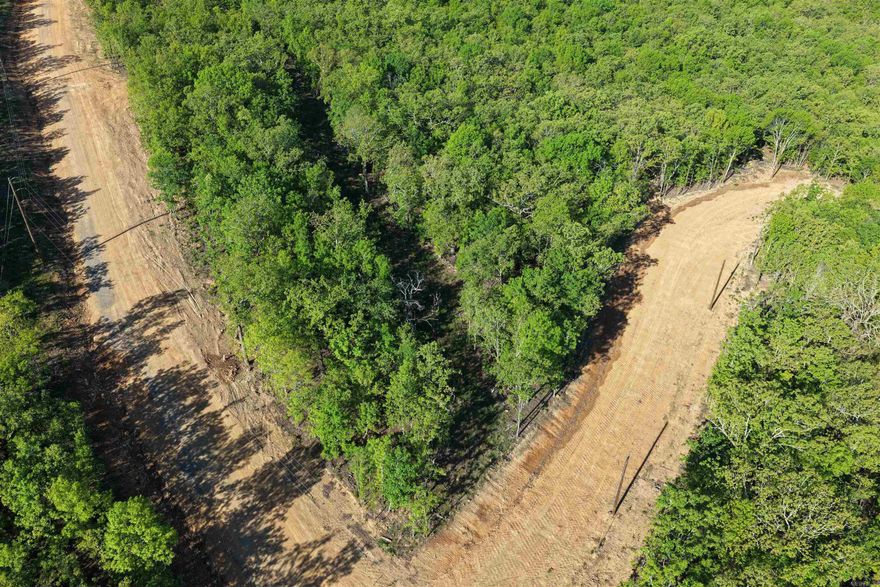 Introducing Seven Lakes Ranch Estates ~ a premier gated acreage community redefining luxury country living in the Conway area. Set against breathtaking views of Lake Conway and Pinnacle Mountain, this exclusive development features seven stocked lakes, scenic nature trails, rolling topography, and abundant wildlife. Each 3–5 acre homesite offers the privacy and space you’ve been searching for, complete with paved roads, a gated entrance, and available utilities. Perfectly positioned just 10 minutes from I-40 in Mayflower, 15 minutes from downtown Conway, and approximately 25 minutes from West Little Rock and Cabot, Seven Lakes Ranch Estates delivers both tranquility and convenience. With community-wide road paving planned for summer 2026, and a 2,400 sq. ft. minimum for this lot, you’re invited to bring your builder—or work with one of ours—to craft a custom home that fits your vision.  **Owner financing is available.**