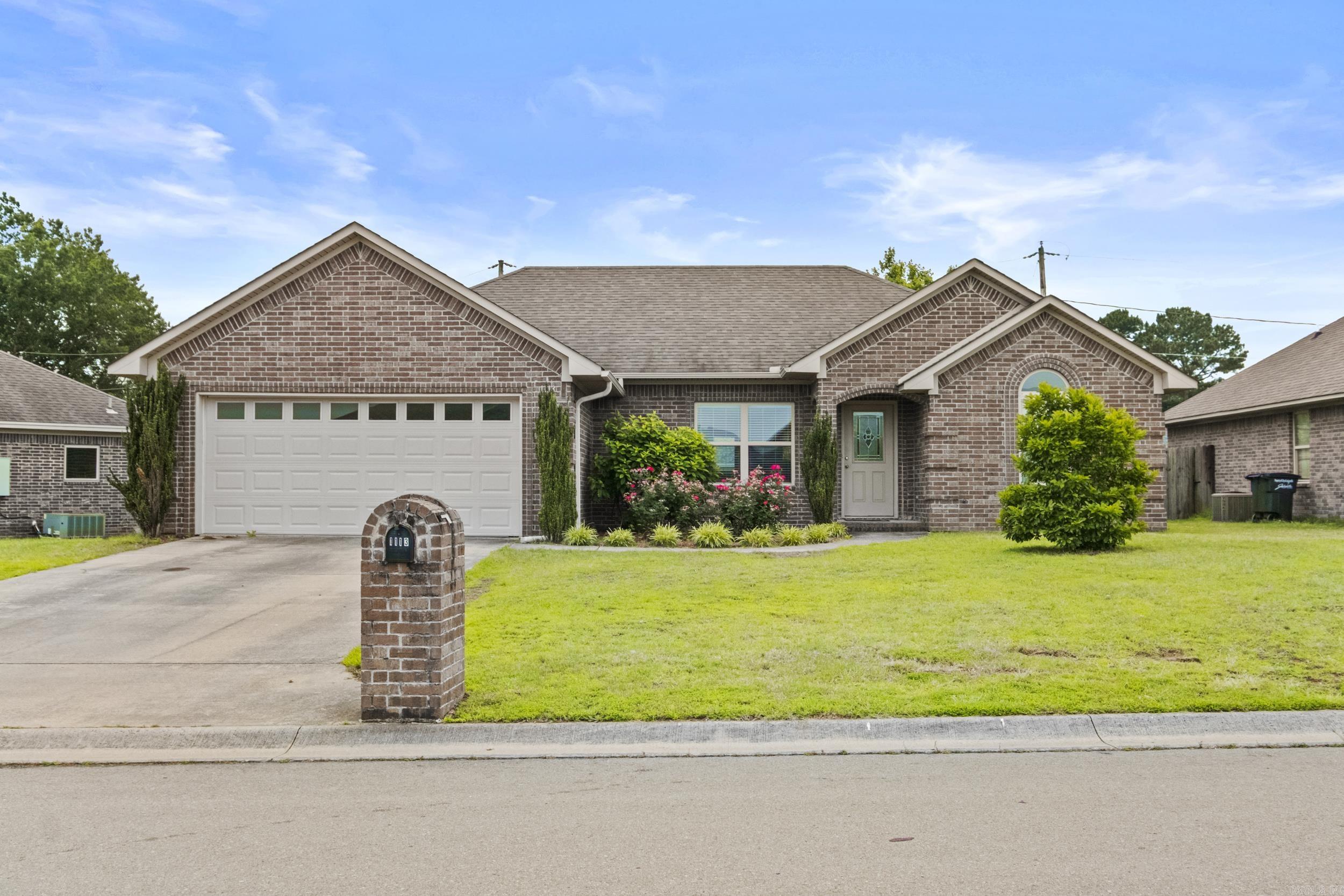 Beautifully maintained home in a quiet subdivision close to LRAFB! Enter into the living room which boasts wood floors and a fireplace with gas logs. The eat-in kitchen is completely open to the living room and features a breakfast bar along with granite tile countertops, hardwood cabinets, pantry and stainless appliances. The split floor plan includes a spacious primary suite with a lovely tray ceiling. The ensuite bath has a jetted tub in addition to a shower, double sinks and walk in closet. The two guest bedrooms are situated away from the primary and share a nice sized hall bath. The front bedroom features a vaulted ceiling. The level backyard is fully fenced, includes a recently redone deck and blueberry bushes! The HVAC & Water Heater were replaced with in the 2 years.