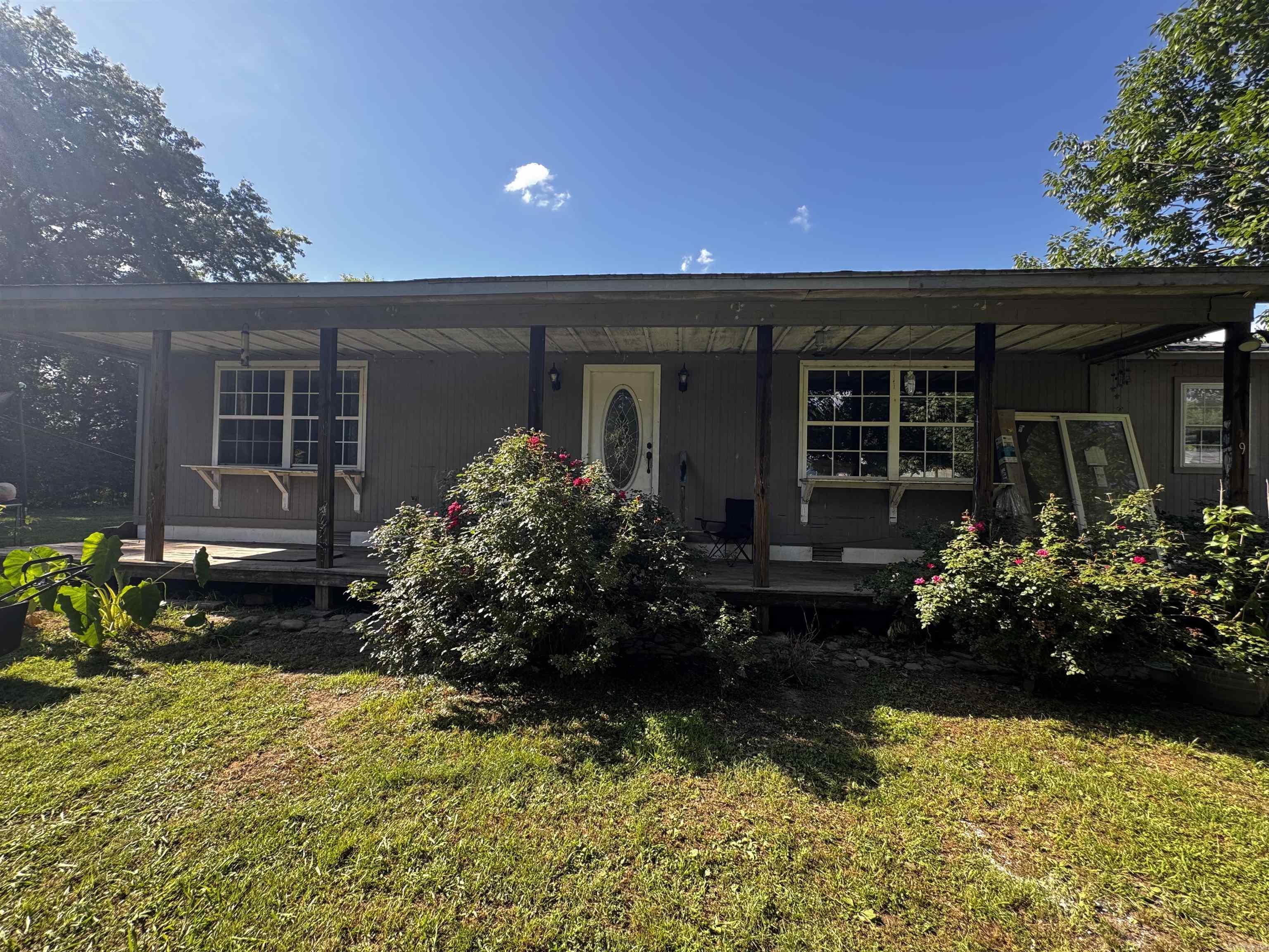 INVESTORS! Two for the price of one - 9052 highway 64 is a 1584 sq ft home with tall ceilings and an open floor plan. This home offers a very large primary suite with a large garden tub and walk in tiled double shower. The large lot offers room to grow and play! There is a manufactured home with electric and water on the property thatās ready to be demolished and moved to put in your dream shop or remodeled into a secondary home.