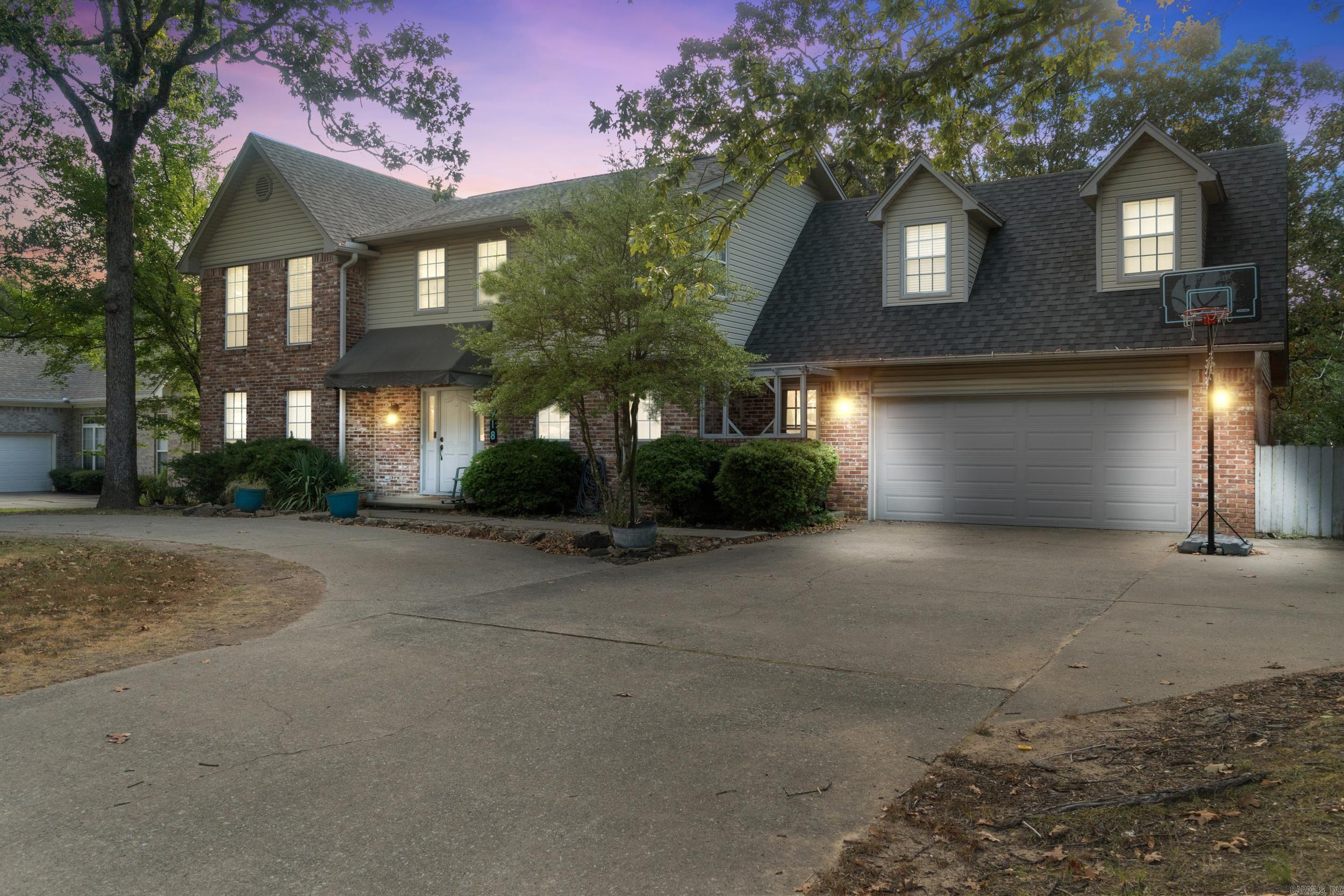 Welcome to your dream home in the Overbrook subdivision of North Little Rock, AR! This spacious 2800+ sq ft house features 4 bedrooms and 2.5 bathrooms, sitting on nearly half an acre. You'll love the convenience of nearby shopping, restaurants, and schools, with easy access to I-40. Inside, enjoy nice stainless steel appliances, quartz countertops, a stunning master suite with wood beam accents, and a large bonus room perfect for relaxation. With two staircases and plenty of storage, this home has everything you need! Step outside to your backyard oasis, complete with a multi-level deck, an outdoor stone fireplace for cozy gatherings, and a workshop with electricity for your projects. Don’t miss out on this amazing opportunity—schedule your visit today and see why this home is the perfect fit for you!