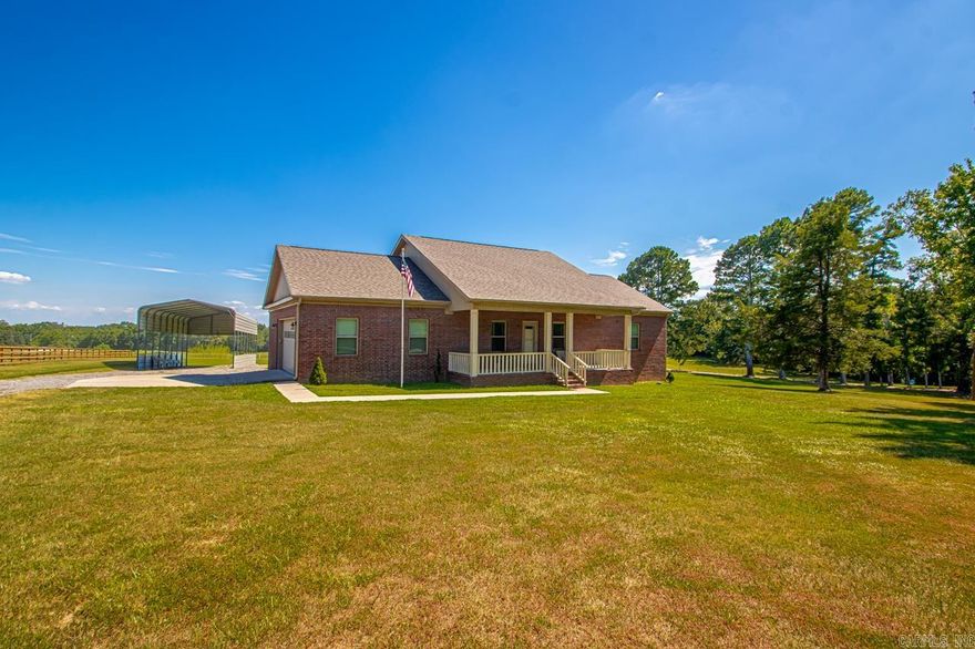 Very well-built full brick home situated on a beautifully manicured 3-acre lot.  This solid home features a 5/8" plywood roof and custom cabinetry by local, well known cabinet builder, Bradley Harden, complete with soft-close doors, a spacious island with full storage, and under-cabinet lighting.  The open kitchen flows into living area with vaulted ceilings throughout living space. Home is complemented by durable LVP flooring throughout. Enjoy the convenience of a large laundry room with sink and storage, a dedicated workspace off the garage and ample storage throughout home.  Relax on the inviting front and back porches.  Additional features include RV cover and attention to detail in every corner of thoughtfully designed home. Portable generator for house hookup to convey with home.  35 minutes to Hot Springs National Park, Bathhouse row.  25 minutes to Arkadelphia, Arkansas.    ( taxes are before homestead credit)