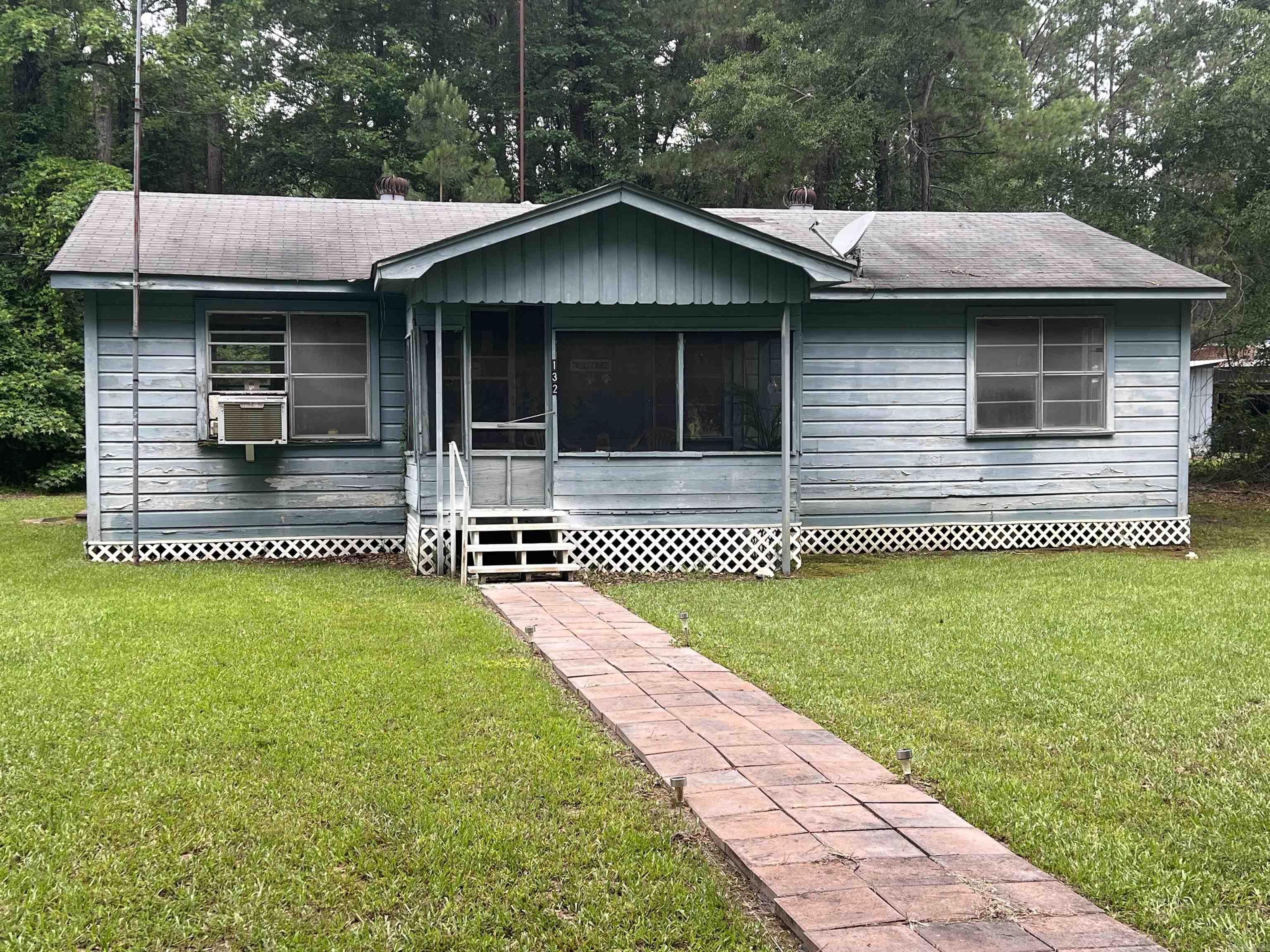 With a little TLC, this property will be a perfect investment property or first-time home buyer. Hardwood floors through-out, new paint, and new hardware on kitchen cabinets. Give us a call to take a look!