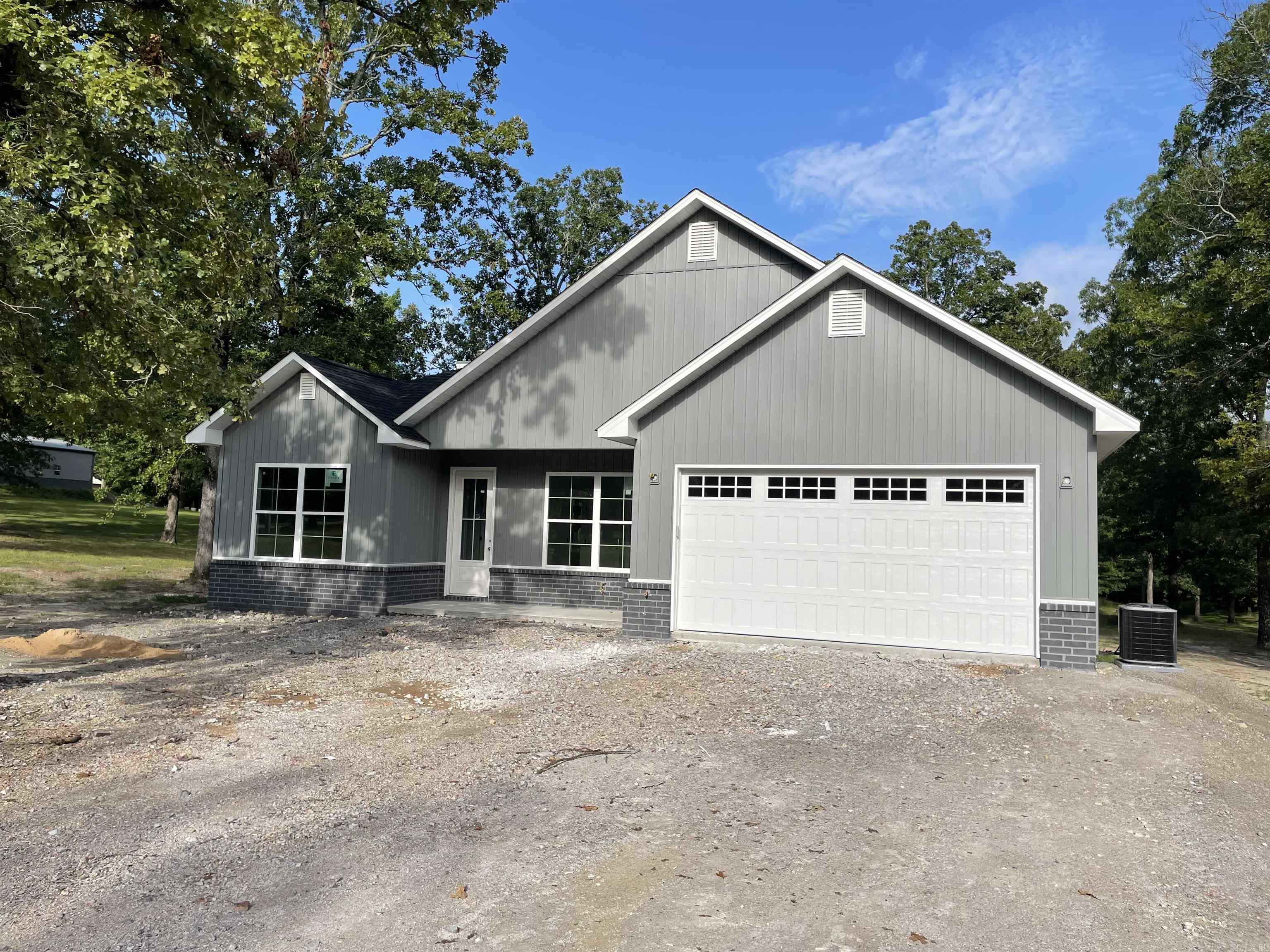 UPDATE: Your Brand New Home is further along in progress in one of the most Gorgeous areas in Hot Springs! Exterior has been completed and garage door installed. HVAC has been installed as well. On the inside drywall is in and should be getting interior fixtures, paint and flooring very soon! Its Almost Ready.. Come check out the progress on your new home! You will be enamored with this home and mesmerized by its rustic charm! You can't help but come under the spell of the mature oaks, the majestic mountain overlooking your home and the air of serenity that prevails! You will be able to spread your wings on the homes spacious 2acre lot with so much room for expansion. Located outside city limits but yet not far from town. This home will be equipped with 9ft ceilings, stainless steel appliances, wood/gas fireplace, crown molding and much more! An attachment with additional energy and features can be provided. Stay tuned for more updates on this property.