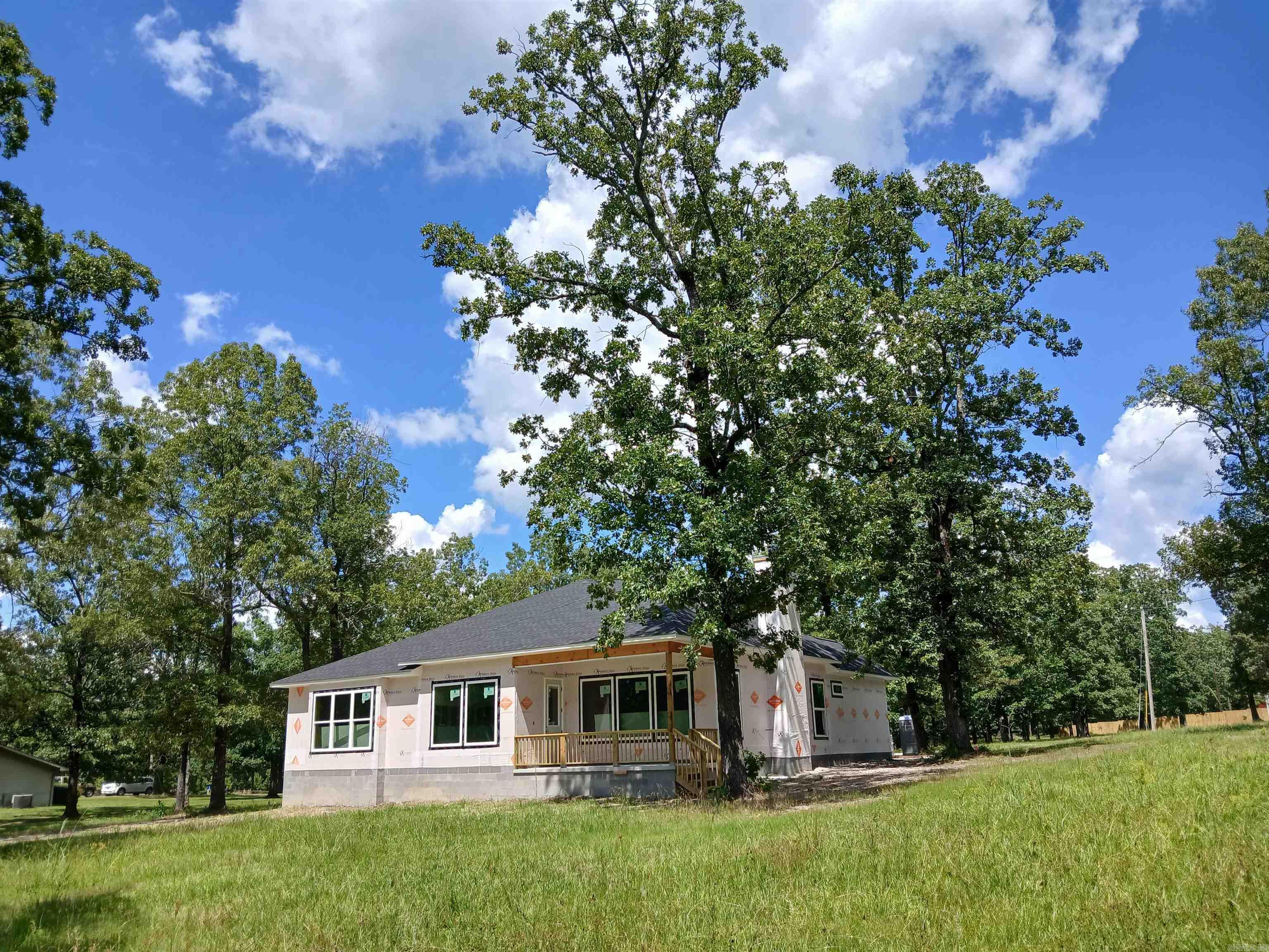 Your Brand New Home is being completed in one of the most desirable areas in Hot Springs! You will be enamored with this home and mesmerized by its rustic charm! You can't help but come under the spell of the mature oaks, the majestic mountain overlooking your home and the air of serenity that prevails! You will be able to spread your wings on the homes spacious 2acre lot with so much room for expansion. Located outside city limits but yet not far from town. This home will be equipped with 9ft ceilings, stainless steel appliances, wood/gas fireplace, crown molding and much more! An attachment with additional energy and features can be provided. Stay tuned for more updates on this property.