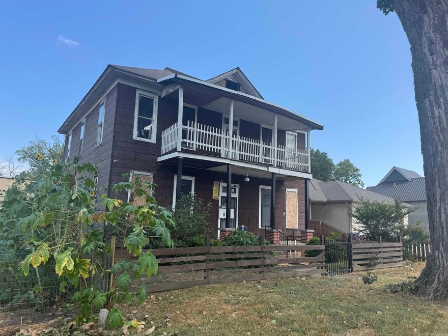 Attention INVESTORS!! Location, Location, Location!! Heart of Argenta surrounded by NEW CONSTRUCTION and remodels!  Very large house with endless possibilities...! Upstairs has 6 bedrooms, 1 bathroom Downstairs has 3 bedrooms, 2 living areas, 2 bathrooms. Total remodel needed. Back alley access and driveway with a separate storage building. Please do not just go off of listing photos, drive by or look at Google Earth, etc to see area and get a real idea of the potential. Property is being sold AS-IS. No Disclosures. Enter at your own risk