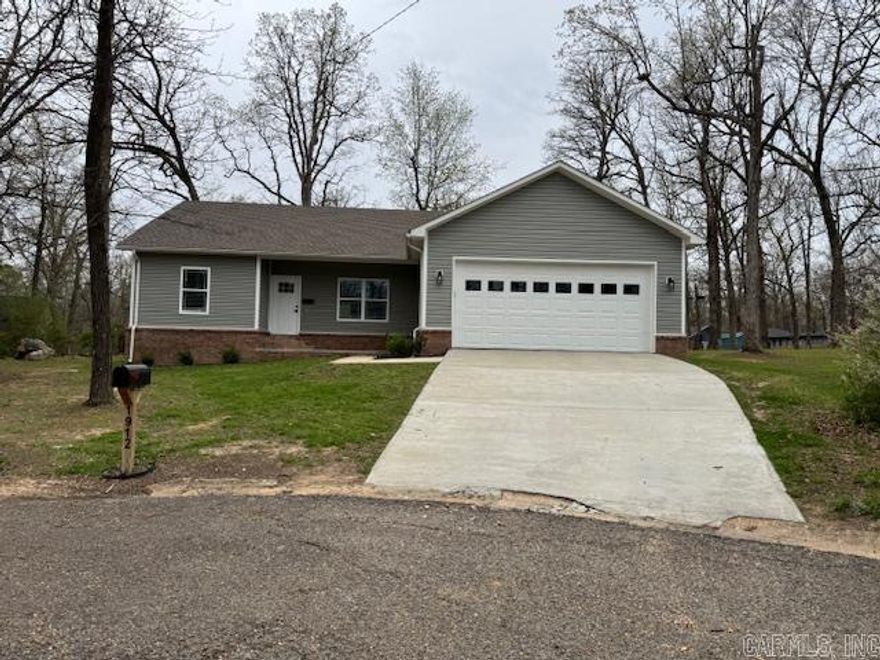 NEWER HOME ON .75 ACRE!  Built in 2023 this all electric home sits on .75 of an acre large double lot with room for a shop! Includes a 10X12 storage building that matches the home. 160 square foot patio off the kitchen for backyard entertaining. Inside, with 1584 square feet, you’ll find a spacious living room, a kitchen and dining combo with lots of cabinet space, stainless appliances and granite countertops. Large laundry room with folding counter, just off the two car 528 square foot garage. A beautiful master suite with double vanity, tiled tub as well as a walk-in closet. Across the home are two more spacious bedrooms with a guest bathroom and tiled tub. This home is on a very quiet cul-de-sac with close proximity to the schools, hospital and shopping!