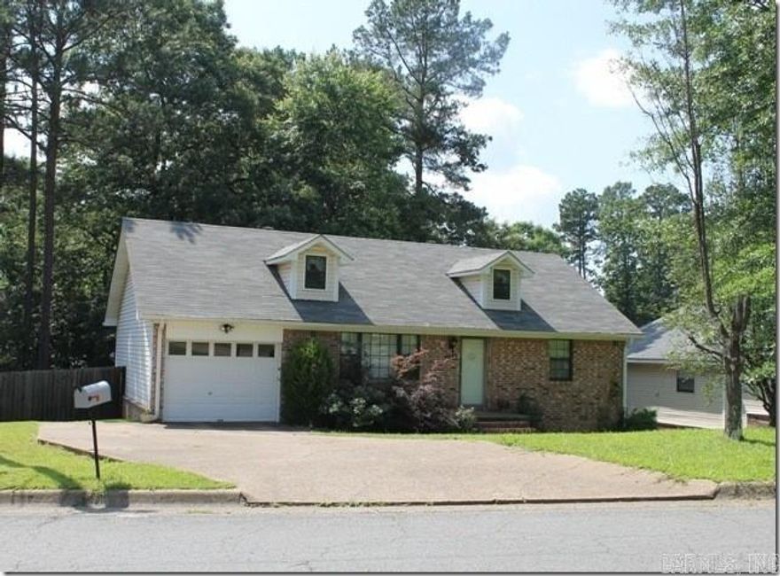 Come take a look at this BEAUTIFUL HOME with lots of features: TRIPLE-PANE WINDOWS, 12'x19' REAR DECK, fenced in back yard, BASEMENT LEVEL SHOP, UPDATED INTERIOR including Large Great room, adjoining dining area, kitchen with GRANITE TILE counter-tops and STAINLESS STEEL appliances. Main BA with SLATE TILE tub/shower surround and vanity counter-tops. Stained BAMBOO and PORCELAIN TILE flooring. Two unusually BIG BEDROOMS and lots more updates await you. Come and see your NEXT HOME!