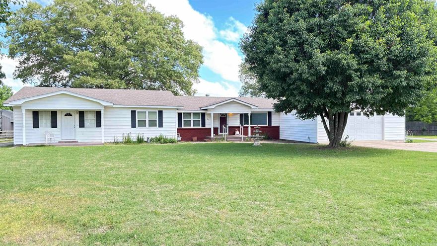 TWO HOMES !!! If you have a need or desire for 2 homes with independent living quarters, you've landed! Each homes has it's own kitchen, bedrooms, living areas, bathrooms, utilities, laundry area, parking and entrances! The main home has 2763 sf of heated and cooled space with a two car garage. The primary bedroom is large enough for oversized furniture and could accommodate a modest office space and sitting area. The primary bath is equally proportioned with double sinks, separate tub and shower and space to move about. A huge game room complete with pool table is also a room with varied and flexible uses.  A fully equipped kitchen, a living room, 2 additional  bedrooms, laundry room and walk-in pantry complete this home. The guest house has 1026 sf, 2 BRs, 2 BA, a kitchen with lots of countertop space and cabinets, living room and  laundry hook-ups . This home has it's own driveway and carport also! A 980 sf shop and a 10x12 storage building are also on the 1 acre grounds. The shop has 2 overhead doors and is mostly open except for a wall that was constructed for sectioning off a small once occupied living area. The acre is level and is not in a subdivision! See agent remarks