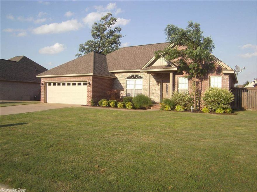 This is a great 3 bedrooms, 2 baths home. It is brick with decorative accent stack rock on the front and professional landscaped for added curb appeal. Enter the spacious Living area with 10 ft ceilings, wood floors and a central gas log fire place surrounded  by built-ins. The ceiling height continues into the large kitchen and dinning area.  Covered back patio and privacy fenced back yard. Take a look at this home today.