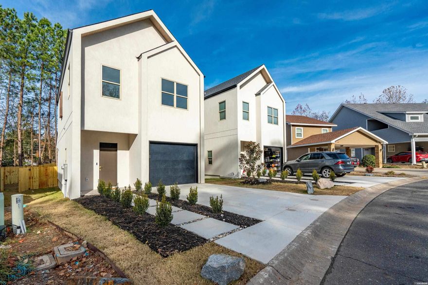 This newly constructed townhome offers a modern and comfortable layout with three bedrooms and two bathrooms, designed for easyliving. The open-concept main living area features clean lines, contemporary finishes, and plenty of natural light. The kitchen flows seamlessly into the other living spaces, making it ideal for everyday living and casual entertaining. The primary bedroom provides a private retreat with an en-suite bathroom, while the two additional bedrooms are well-sized and versatile—perfect for family, guests, or a home office. All bathrooms showcase modern fixtures and fresh, polished finishes. A covered outdoor patio with wooden privacy screens on each side. A fully fenced backyard offers privacy and outdoor space for relaxing, pets, or small gatherings. The one-car garage provides secure parking and additional storage, adding convenience to the home’s thoughtful design. Overall, this townhome combines new construction quality with practical features and a welcoming, contemporary feel.