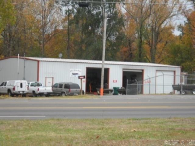 Great Shop, High Visibility and Traffic Area!!!! This 3 bay shop can be used for several different types of services, currently it's a marine service shop with a bay used for painting. There's a large office with a restroom and plenty of storage in the loft above the office. If you are looking for a great business opportunity - here's your chance - possible owner financing with the right amount down. Agents see remarks