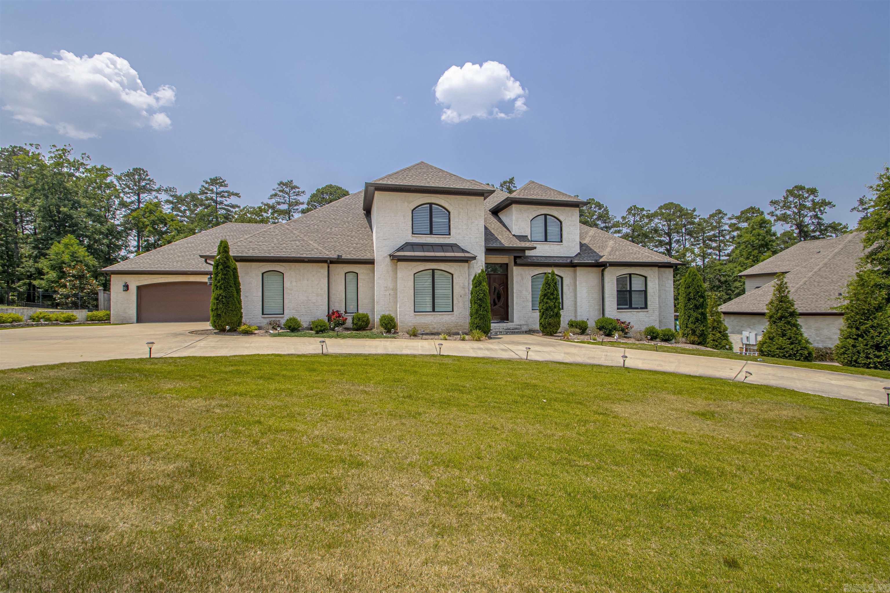 This custom built home is in a great location. 5 bdrms, 5 -1/2 baths, Office or study . Hardwoods, carpet and Marble flooring. Formal Dine, open greatroom, Huge Kitchen that opens to den and breakfast area. Breakfast bar and kitchen counter tops are granite. Lots of windows across back of home that over look a large and private back yard. Bdrms up and down. 3 bdrms on the main level. Two primary suites. The high ceiling's give this home a spacious feeling. Bdrms upstairs are split with a entertaining area located between them. 4 car garage. Covered deck has extensive seating. This home is unique in every way! Square footage is strictly approx- not measured- sq footage taken from tax records. Lot size has been taken from tax records. All information is deemed reliable but is not guaranteed. Buyer should confirm all info to their satisfaction.