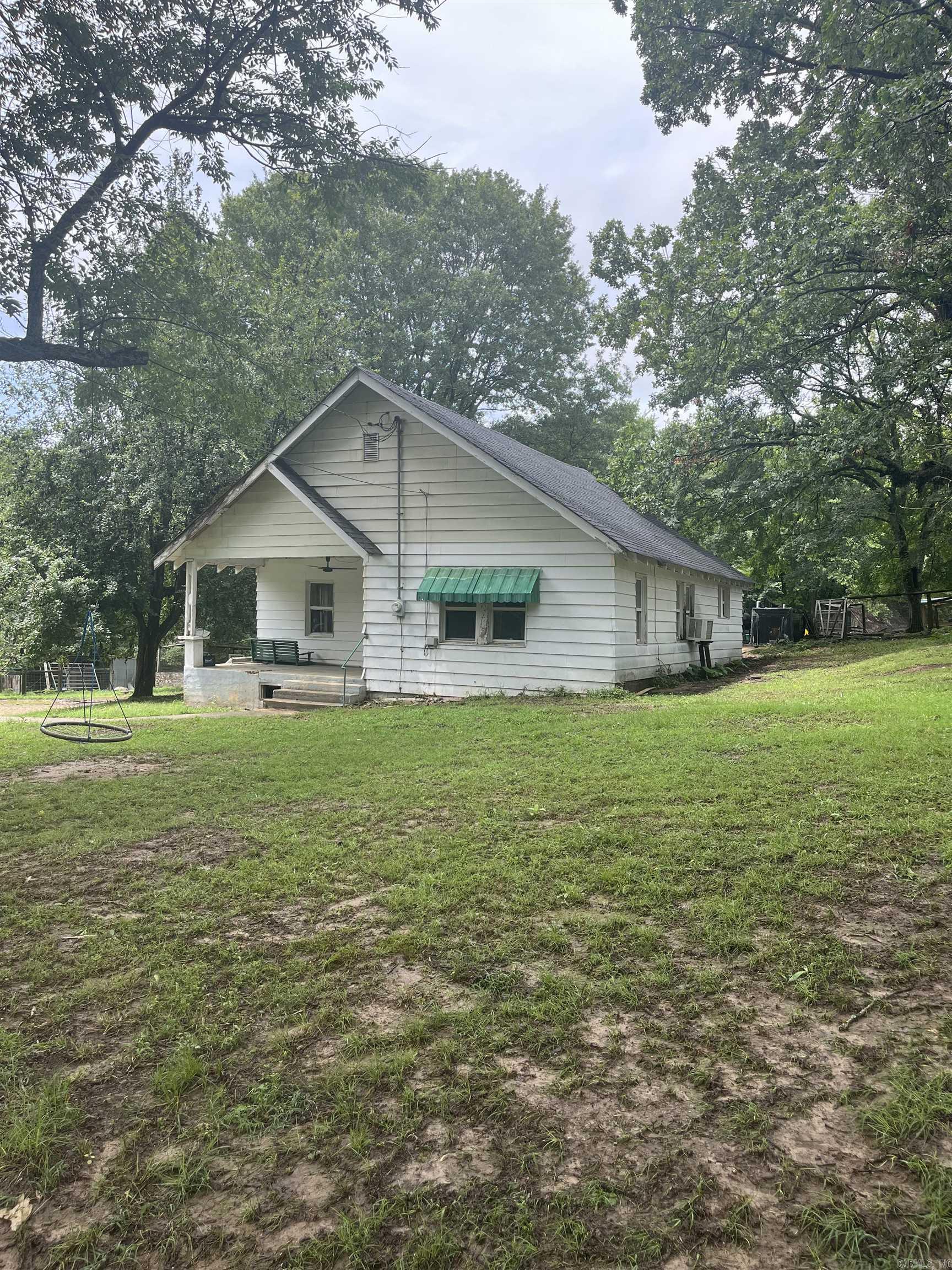 MOTIVATED SELLERS!!! Charming 3+/- acre property with a 2 bed, 1 bath fixer-upper home, features include a new roof (2023), storm shelter, cross-fencing for livestock, two creeks, chicken coop, garden space, peach, pear and persimmon tress and a versatile carport barn. Ideal setup for a homestead, hobby farm or rural retreat. Just minutes from the Caddo River and local amenities. A great opportunity with room to add value.