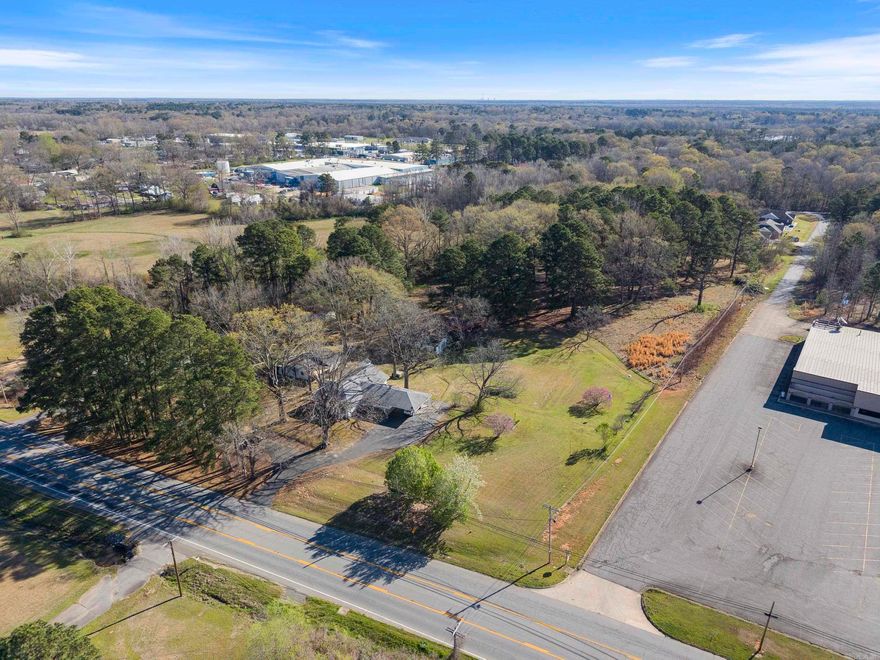 Located on a busy road in the center of a rapidly growing town, this commercial property offers an unbeatable opportunity for businesses looking to establish or expand their presence. With heavy traffic flow and close proximity to other successful commercial establishments, this location ensures high visibility and accessibility. Whether you're looking to open a retail store, office space, or restaurant, the potential for growth and success here is substantial. The surrounding area continues to develop, making this property an ideal investment for future expansion.  Don’t miss out on this incredible chance to invest in a prime piece of commercial real estate. The possibilities are endless, and the future is bright for businesses in this location!