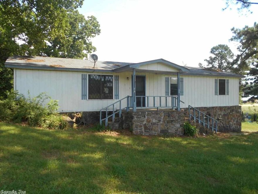 Beautiful acreage with 3 bedroom home. Great place for horses or raise cattle. Great pasture land, pond. Large kitchen with lots of cabinets, relaxing deck, double garage or shop under home. Seperate Homesite with older mobile home. ( Check Legal Description) Property Sold "AS-IS" Buyer Must Provide POFunds/Pre-Qual Letter & Required To Fill Out Attached Docs Under the Documents Section of MLS.  AGENTS:See Confidential Remarks! BUYER SHOULD MAKE THEIR OWN DETERMINATION ABOUT IF PROPERTY IS MOBILE HOME!!