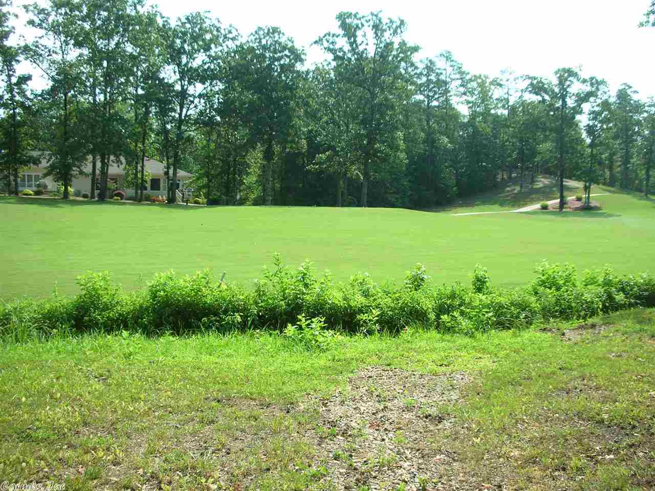 Very level lot on Isabella Golf Course. This lot has 176 feet on the 5th hole of Isabella - Nina Course. The rear exposure faces North East. Pictures 7-10 are of the Hot Springs Village area.