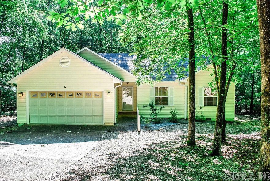 Well maintained three bedroom home in quiet subdivision. Enjoy winter views of Lake Cortez from your deck or Arkansas room located off your Primary bedroom. LVT floors throughout with tile in bathrooms and entry. Granite countertops in kitchen. Refrigerator to convey. Pull out drawers in pantry. Two car garage with storage. Roof 2023, HWH 2019, HVAC 2017. $1500.00 Buy in Fee for all new HSV POA members. Agents please read remarks.