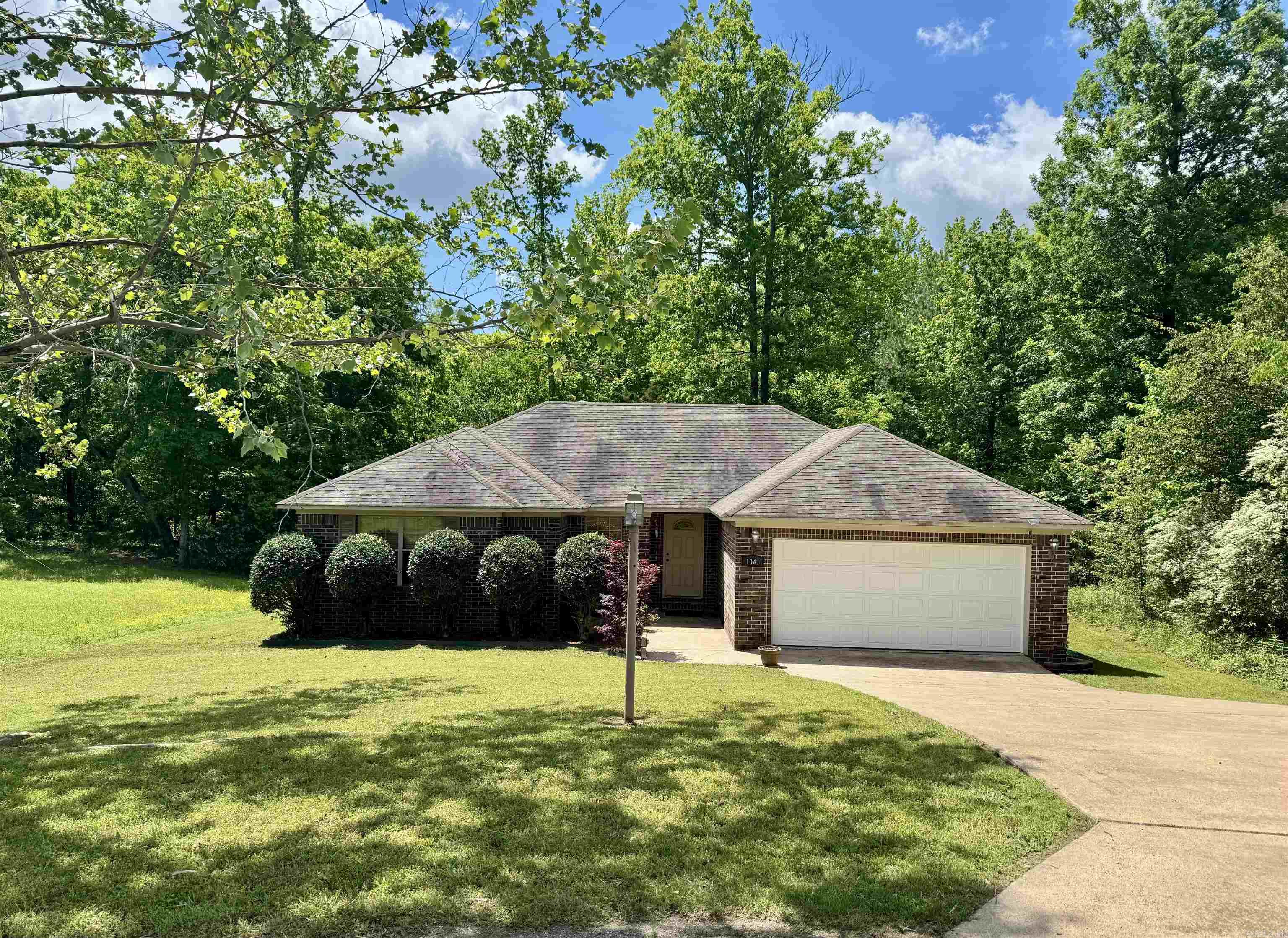 Looking for an affordable home located in the Prestigious Fountain Lake School District? Take a Look at this 3 Bed 2 Full Bath home setting on a large lot in Lonsdale AR. New Roof will be installed before closing. Home is located only 20 mins from the Hot Spring AR and all the attractions it has to offer. This house has a great floor plan featuring a split floorplan so the kids or guest have their own side. The Primary Suite is spacious with a large bathroom featuring a jet tub, separate large shower, dual vanity sinks, and his and her walk-in closets. This home will not last long schedule your showing soon.