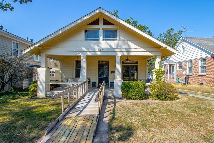 Come check out this truly historical Hillcrest bungalow in all of its convenience and charm! Just within walking distance to all shops and restaurants in Hillcrest Historical District and centric city location. Stepping up to the front door you’ll notice the lovely front porch with a built in porch swing. The layout features an open living room and dining area with architectural embellishments of coffered ceilings and built in columns. Moving to the right off of the living/dining area, you find the off-kitchen breakfast area, kitchen and laundry room. To the left, you’ll find the bedrooms and bathrooms with ample closet space, a master with conjoining office space and in-suite master bathroom. Additionally, off of the laundry room you have a back patio leading to a fully fenced backyard and a 2 car spaced garage. Original 1930’s hardwoods and 10 ft ceilings throughout the home  and original bathroom tile give this bungalow a classic and timeless appeal. The roof was replaced in 2016. All appliances convey. Shared driveway and shared garage structure (2 of the 4 garage spaces are on 704 N. Monroe property).