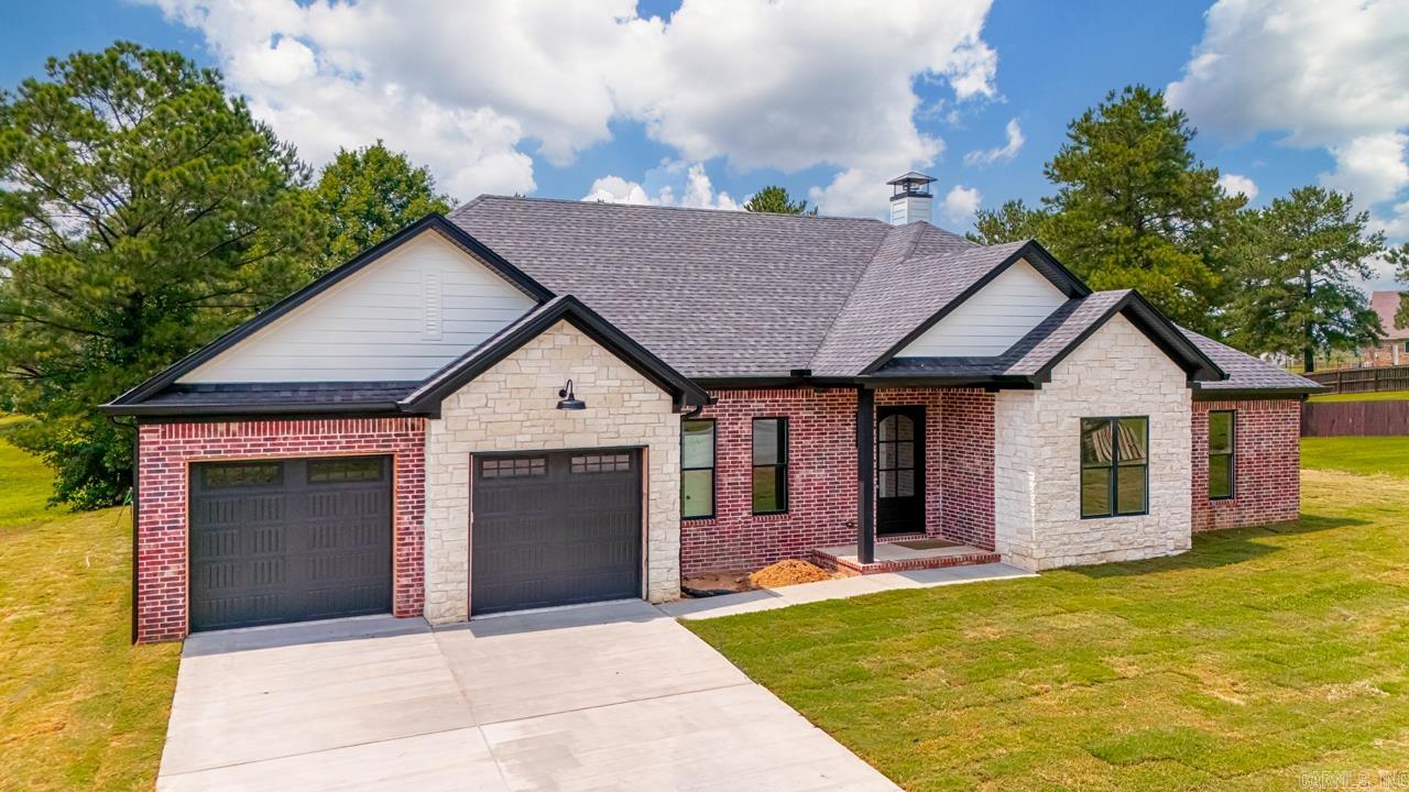 New Listing in East End! Pleasant Lake Estates. New Construction. 4 Bedrooms with office (could be 5th bedroom but small). 2.5 Bathrooms. Approx. 1.51 Acres. 3 Fireplaces!! Living room, kitchen and dining all open with wood burning fireplace in kitchen. The kitchen has a beautiful gas top stove (oven electric) and a pot filler. Home has lots of black and gold accents. The primary bedroom has a black wall with electric fireplace. The primary bathroom has a custom tiled shower. Elegant soak tub. Two large walk in closets. Extra bedrooms have carpet and are split from primary. The back covered porch has an awesome space with a wood burning fireplace. Enjoy the beautiful lake access in neighborhood for fishing and long walks/running. See video. Call to schedule your appt today.