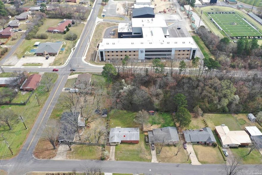 Charming and move-in ready, this beautiful three-bedroom, two-bath brick home is perfectly situated in one of the area’s most desirable locations. The freshly painted interior creates a bright, welcoming feel throughout, while the updated kitchen and bathrooms offer modern finishes and stylish touches that today’s buyers will love.  Enjoy comfortable living spaces designed for both relaxing and entertaining. Step outside to a lovely, fenced backyard—ideal for kids, pets, gardening, or weekend gatherings.