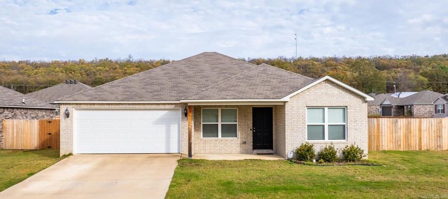 This modern, 4 bedroom/2 bath home, built in 2021, is located in a desirable subdivision offering convenience and comfort. Just minutes from I-40, it's perfectly situated near shopping, dining, softball and soccer complexes, and entertainment. With its contemporary design, spacious layout, and prime location, this home is ideal for those seeking both style and accessibility. Schedule your showing today!