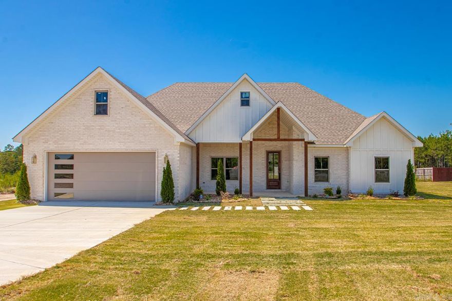 WELCOME TO YOUR DREAM HOME!!! This stunning 4 bedroom, 2 bathroom property sits on a flat 1.86 acres of land! Step inside to find an inviting open/ split floor plan! The home features an electric fireplace, spacious pantry, tons of cabinet space in the kitchen as well as a gas stove. The laundry room flows seamlessly to the master closet and into the primary bathroom and bedroom! With so much attention to detail, this home is as functional as it is beautiful!! Outside, the expansive lot offers endless possibilities- room to play, garden or simply relax and take in the peaceful setting!! Do not miss your chance with this beauty!! Home is eligible for RD loan!!! Please see agent remarks!!
