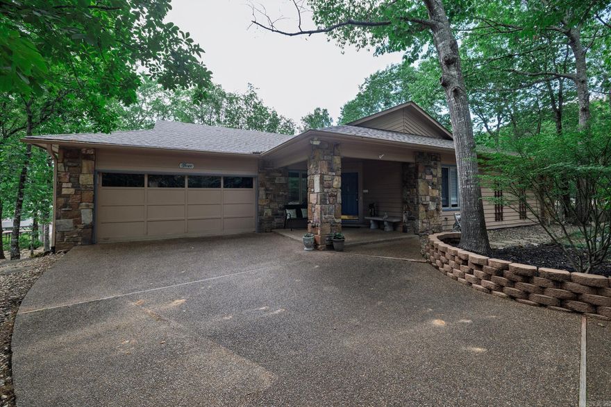 Lake living at it's Finest on over 1/2 an acre. This home is ready for you, your family, friends and a summer of fun! As you open the front door you are greeted with a large Living room and a wonderful view. The main Level includes 3 bedrooms and two updated bathrooms. Your primary sweet includes a wonderful walk in shower. The updated kitchen overlooks your 440sq ft deck and again fabulous views. A beautiful 4 season room is the perfect spot to curl up and watch the sunset. There is a lower level bonus space with a 4th bedroom, 3rd bath and a family room.  When you get down to the water you will see two boat docks, and an  oh so fun swim slide perfect for all ages!