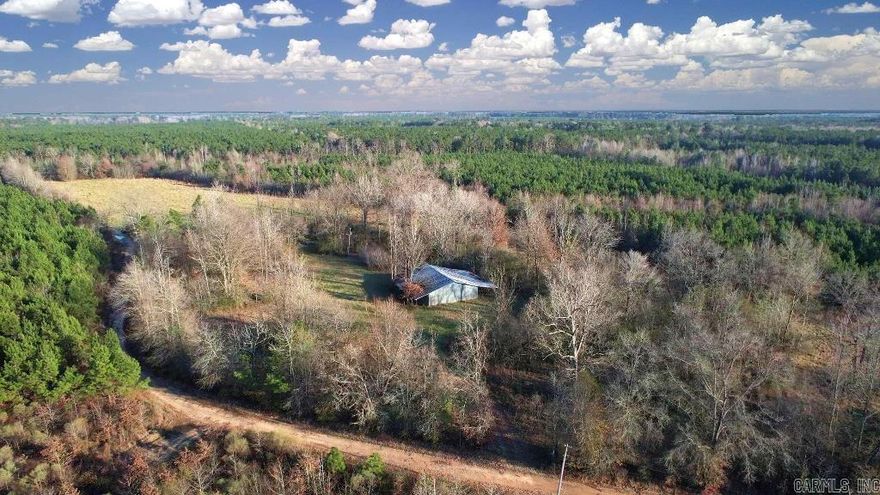 With no zoning or deed restrictions, welcome to a life of total freedom. Pull right up to your the barn and start building your dream farmhouse today!  -No Restrictions! -Well Built Barn in Excellent Condition -Water & On-Site Power -New Road & Drainage Infrastructure -New Survey -Very Buildable: No Floodplain, Flat, Mostly Clear