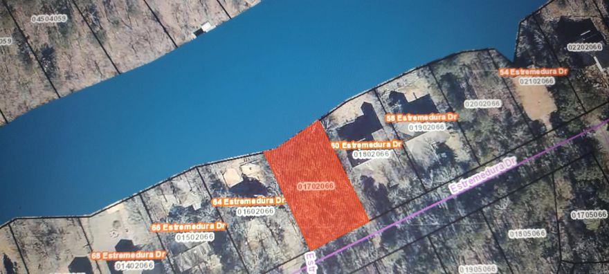 Lake Pineda WATERFRONT! Nice building lot with approximately 85 feet of water frontage. Gradual slope to the water with no apparent drainage issues like many other lots have. Nice homes on either side help to imagine what you can do here! Water/sewer/ele all available. Hot Springs Village is a gated 26,000 acre community with 11 lakes and 9 golf courses. This convenient location near the Glazy Peau gate allows for a quick trip to Walmart or with the new bypass - to Hot Springs! Enjoy 20+ miles of trails, the Coronado Fitness Center, Woodlands Auditorium, Tennis, Pickleball, Miniature Golf, Bocce Ball, Archery Range, Dog Park, 2 Pools, many clubs, churches and activities!