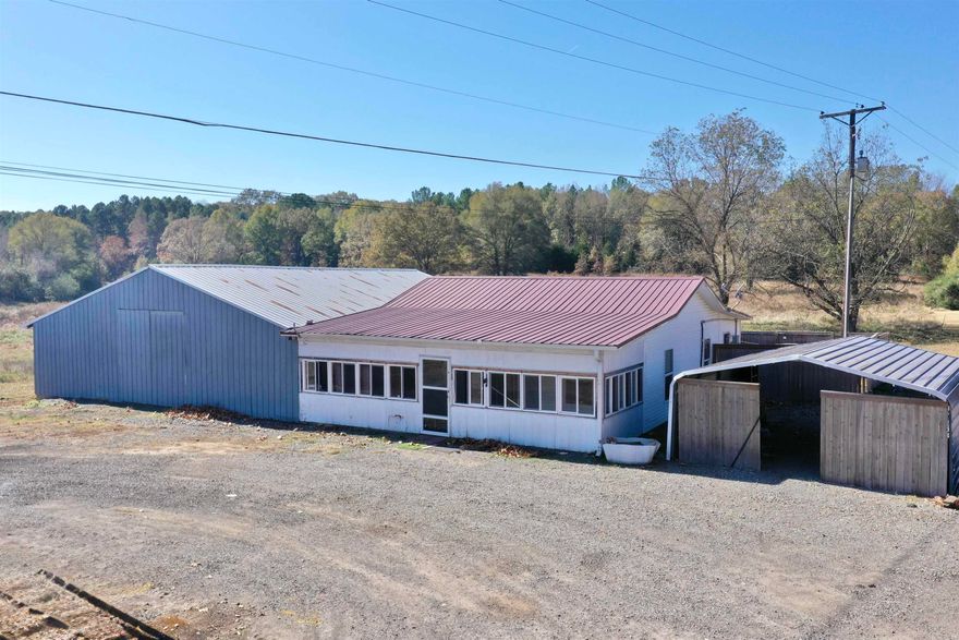 This 2 bedroom, 1 bath home sits on 7.8 ACRES with a pond just outside of Pangburn. Approximately 450 feet of Hwy 16 frontage. Large 40x50 shop and metal covered carport. Lots of options, live in the house and operate a business from the shop, build or place a mobile on the acreage and use the house as investment property. Previously an income producing, long-term rental. Great location and endless possibilities with this property.