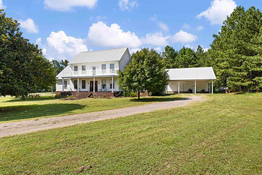 Come and experience the charm of this stunning 5-bedroom, 3-bath home offering 3,539 sq ft of beautifully designed living space. Step into a welcoming living area with soaring cathedral ceilings and a cozy wood-burning fireplace—perfect for relaxing evenings. The eat-in kitchen features granite countertops, double ovens, and plenty of counterspace for entertaining. Enjoy your morning coffee on the covered front porch while taking in the serene views of the surrounding pasture and wooded landscape. This home also includes a dedicated study, a sunroom filled with natural light, and a formal dining room, providing plenty of space for both work and play. Nestled on 19.88 acres +/- of rolling pasture and woods, with a barn. It's the perfect blend of comfort, privacy, and natural beauty. Don’t miss out—schedule your private showing today!