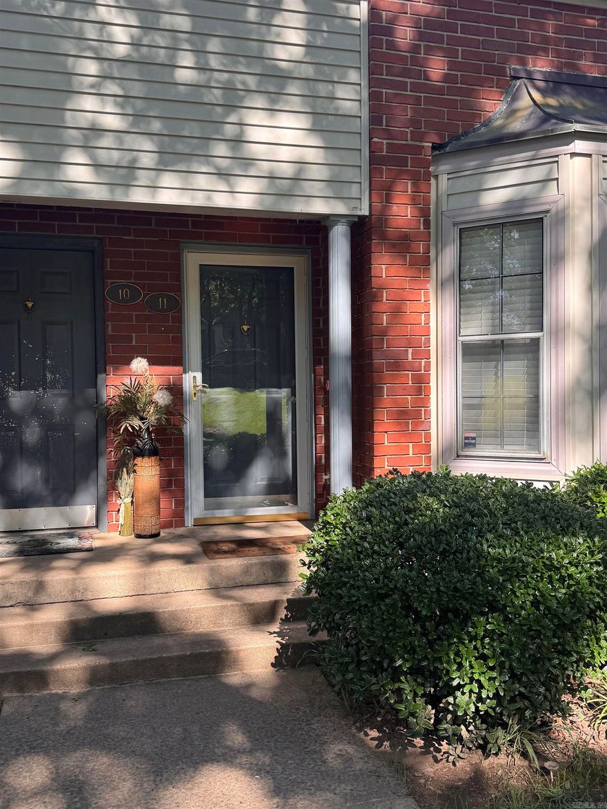 Welcome home to 2221 Wentwood Valley, Unit #11, in the heart of West Little Rock's Pleasant Valley neighborhood. This spacious condo features a living/dining combo with a cozy gas fireplace, primary suite on the main level, two additional bedrooms and one full bathroom upstairs. Rear entry one-car garage, tons of storage, and an unbeatable West Little Rock location.