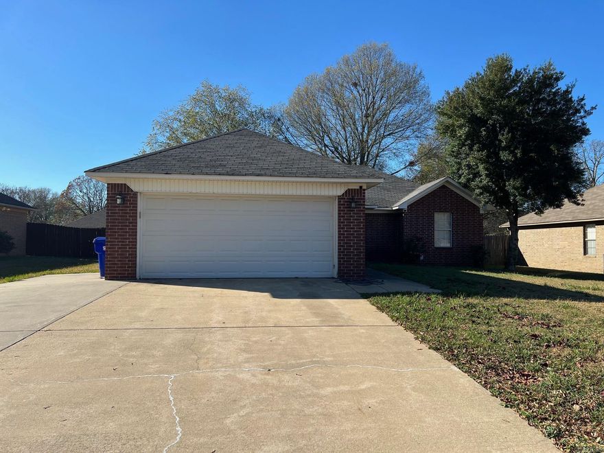 Three Bedroom 2 Bath home. Split Floor Plan  Concrete Floors Throughout Privacy Fenced back yard 2 car garage