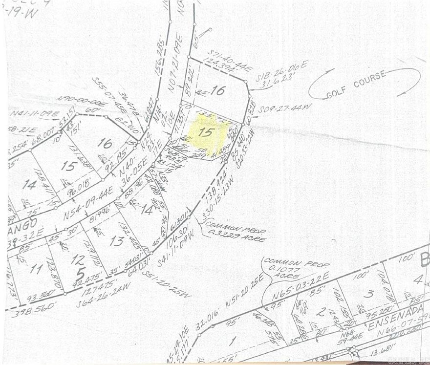 Flat lot in established neighborhood with common property to one side and golf course property to the rear.
