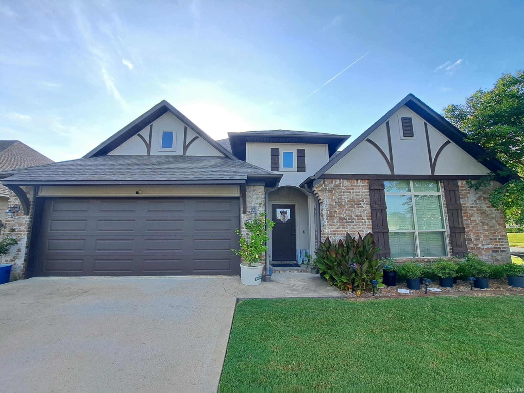 Put this charming MOVE-IN ready home on your must see list. Plantation shutters, new paint, POA maintained yard and sprinklers. All new faucets, updated flooring, granite throughout. Gorgeous landscaping and so much more