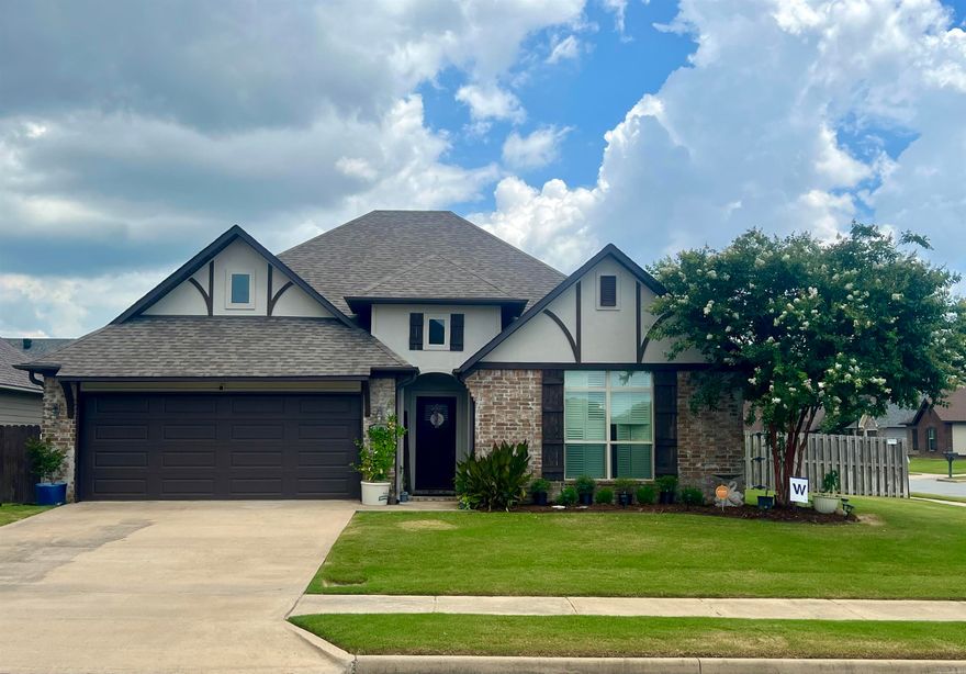 Put this charming MOVE-IN ready home on your must see list. Plantation shutters, new paint, POA maintained yard and sprinklers.  All new faucets, updated flooring, granite throughout. Gorgeous landscaping and so much more