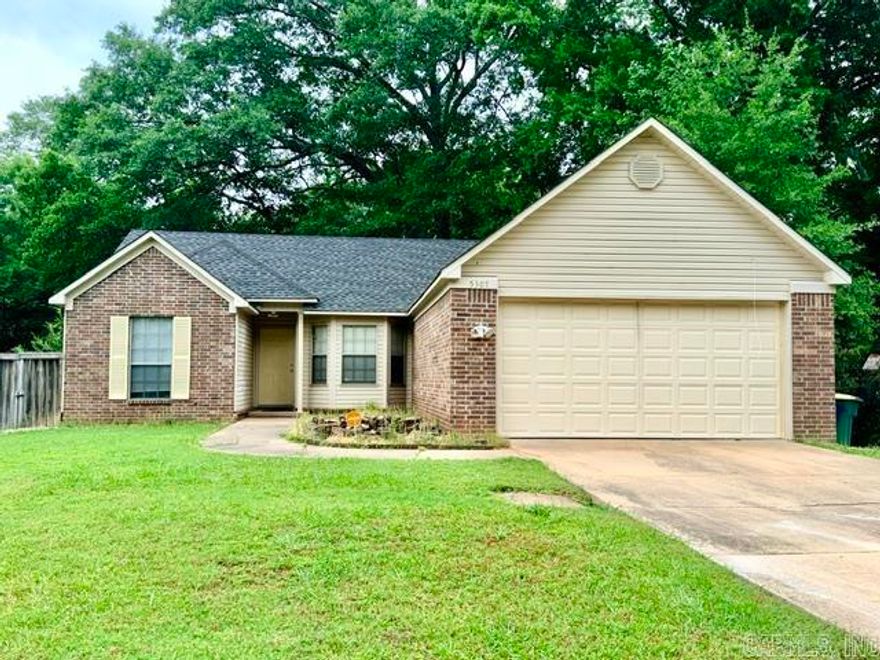 Desirable Tall Timber West subdivision of Little Rock — where comfort, convenience, and functionality come together. This 3-bedroom, 2-bath home offers an inviting split-bedroom floor plan designed for both privacy and everyday living.  Step inside to a warm and welcoming great room featuring comfortable gathering space perfect for entertaining or relaxing evenings at home. The eat-in kitchen provides ample room for casual dining, morning coffee, and welcoming conversations while offering practical flow for daily living.  The spacious primary suite is thoughtfully separated from the additional bedrooms, creating a private retreat within the home. Outside, enjoy a fully fenced backyard complete with a deck ideal for grilling, outdoor entertaining, or simply unwinding after a long day. A 2-car garage adds convenience and additional storage space.  Located in the easily accessible Tall Timber West neighborhood, this property offers quick access to shopping, dining, schools, and major thoroughfares throughout Little Rock.  Move-in ready and available for immediate viewing — this home is prepared to welcome its next owner. Schedule your private tour today.