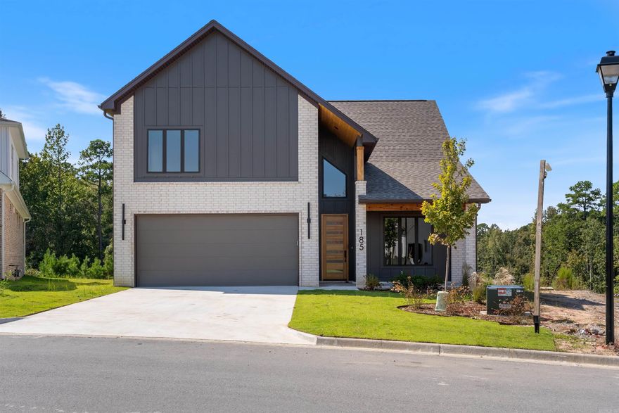 Welcome to your retreat! This stunning 4-bedroom, 3.5-bathroom home by Turner and Sons Construction in Fletcher Ridge exudes elegance and comfort. The kitchen features premium stainless-steel appliances and quartz countertops. The spa-like primary bathroom is a serene retreat with soaking tub and spacious walk-in shower. The large living area provides ample space to gather or unwind. The covered outdoor living space beckons with a beautiful greenspace backdrop, ideal for entertaining. High-end finishes, indoor and outdoor fireplaces, plenty of space, and more!