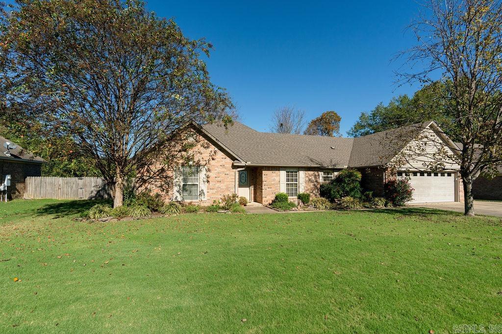 Beautiful, well maintained 3 bedroom, 2 bath, split floor plan home with an eat in kitchen, formal dining room, great room with gas log fireplace and sunroom.