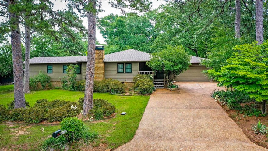 Path to Greers Ferry Lake!  You can enjoy the beauty of Greers Ferry Lake year round.  Enjoy the lake without the price and there's lots of room for boats and toys.  This well maintained home sits on 2 city lots and offers circular drive, shop building w/attached jet-ski lean to, covered boat parking with concrete floor, Morgan building She-shed.  Beautiful antique front door, woodburning fireplace, plantation shutters, wood ceilings throughout, vaulted master, large covered front porch and rear porch, hot tub pad wired, '23 natural gas grill.  Home has a cozy, rustic, comfortable feeling.  Great home for entertaining family and friends.