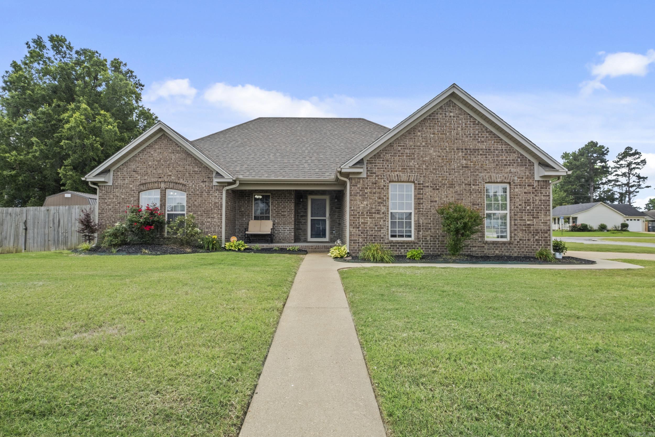 Beautiful home in desired neighborhood with a large corner lot! Your home search is over! This home has many extras in addition to it's great location, perfect for a family or individual. New paint throughout, including walls and doors! NEW flooring in all bedrooms and closets (no carpet)!!! Updated kitchen including NEW painted cabinets, NEW backsplash, NEW quartz countertops, NEW sink, NEW garbage disposal, all NEW appliances (2022) and NEW dining room light! NEW back door! Addition of a NEW 4 person storm shelter in the garage, painted garage floor and NEW mini split unit for extra entertaining in the garage! This owner paid attention to the outside, backyard has covered patio, a 12 ft by 20 ft Bald Eagle Barn storage shed, NEW front and back screen doors, NEW roof (2024) and gutters (2022), extra landscaping, scheduled lawn care 4 x per year plus mowing, termite contract and scheduled 4 x per year insect spraying maintenance. HVAC maintenance 2 x per year. Home has an updated security system with 2 cameras. Call and make your appointment today, this home will not last long!! (Measuring is encouraged.)