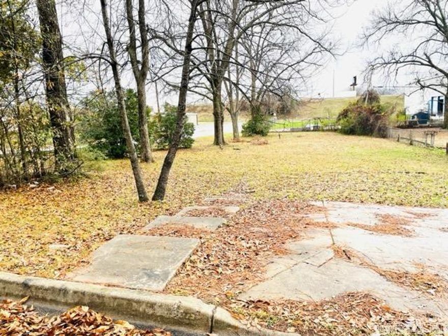 Flat Lot with a lot of Opportunity.  Direct Access to the Highway. Build. Buy and Hold. Close to restaurants, shopping, and downtown North Little Rock. City Utilities.