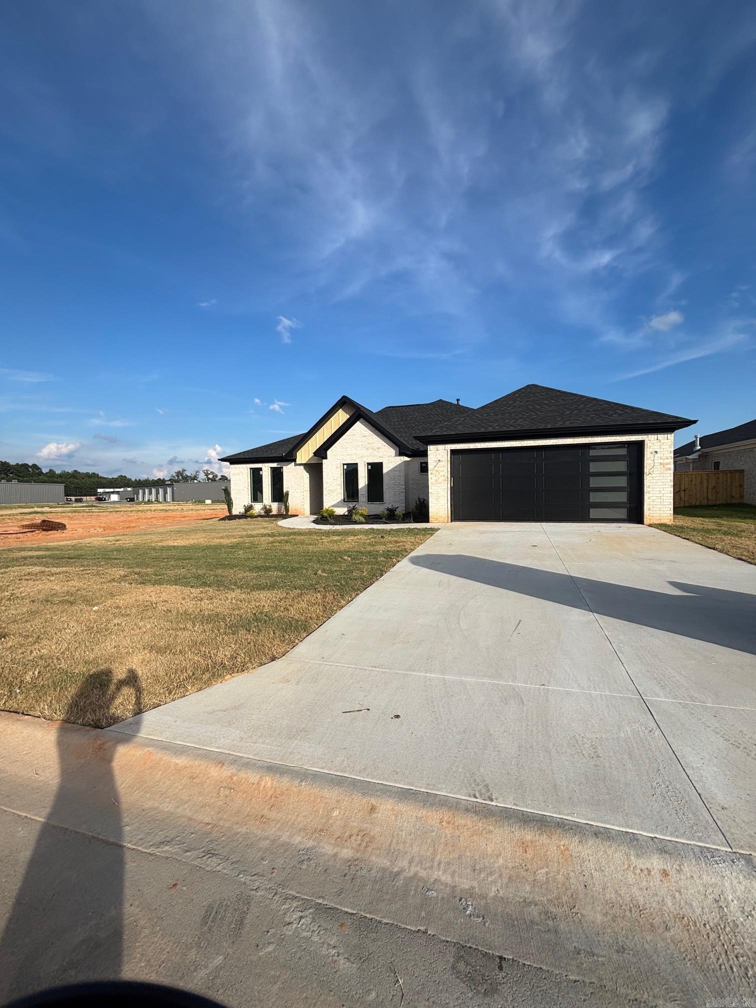 This spacious 4 bed, 2 ba home in East End's newest residential community features an open kitchen/dining/living concept. Large kitchen island for extra seating, prep space, and tons of storage between the beautiful cabinetry and walk-in pantry. Spacious 14' x 14.5' master suite truly caters to the owners with a corner walk-in shower, soaking tub, double vanities, and a master closet with access to the laundry room that's sure to wow you! A drop zone just inside the garage door will keep the mess out of your home, and a full staircase to the attic with floored space over the entire garage means easy access to all the storage you could need. Outside, you'll enjoy a covered back porch perfect for entertaining and (coming soon) just for residents, the Hope Valley playground, dog park, and splash pad, and pickleball courts promise family fun is always just a few steps away. Grocery, banks, and restaurants are within minutes. Families enjoy East End / Sheridan Schools, with the EE Middle School just across Arch Street. All of this in a country setting, while only 20 minutes to LR. (final plans & specs may reflect modifications from the original plan)