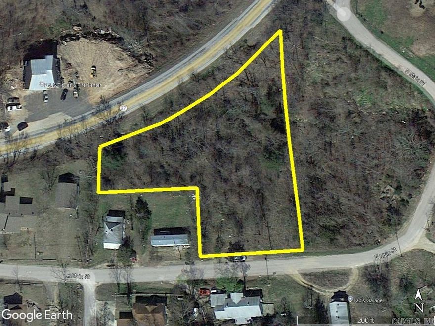 Vacant commercial / residential property for sale in Marshall, AR. 155 feet of East Main Street frontage as well as 315 feet of Hwy 24 North frontage. Approximately 1 acre M/L. Survey on file. This property can be used for building a house or a business. Water, electric and city sewer is available.