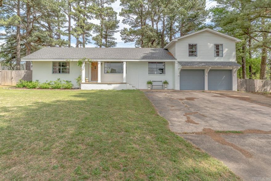 Welcome home to peaceful country-style living with the convenience of town just minutes away! This charming 1,810 sqft home offers 4 bedrooms, 2 baths, and sits on 0.81+\- acres in a quiet neighborhood within the highly sought-after Brookland School District. Enjoy the spacious front and back yard surrounded by beautiful pine trees, offering privacy and a relaxing setting. Inside, you’ll love the updated kitchen, new flooring, and functional layout designed for comfortable living. The primary bedroom features an aesthetic fireplace that can easily be converted into an electric fireplace for added warmth and ambiance. Step outside to the wood deck overlooking the backyard—perfect for entertaining, grilling, or enjoying your morning coffee. A 2-car garage provides extra storage and convenience. Located just a 5-minute drive from the grocery store, you’ll enjoy the best of both worlds: close to town while still feeling like you live in the country. Don’t miss this beautiful property!