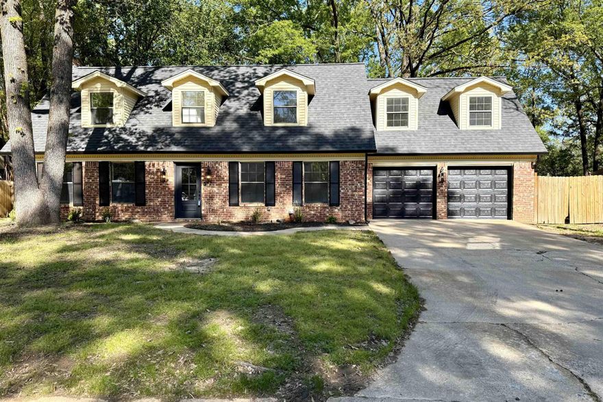 Stunning 4 bed, 2.5 bath move-in-ready home in the desirable Smoking Oaks subdivision, centrally located in West Conway with quick access to Tucker Creek trail as well as shopping, dining, and schools! Remodeled in 2024, all new upgrades include: new architectural shingle roof, new second story HVAC system, new electric water heater, new garage doors, new gutters, new LVP flooring throughout, all new paint, new landscaping, plus all lighting and electrical inside and out has been upgraded and replaced including a brand new breaker panel. Situated on a shaded lot with a large backyard, this two-story home features two separate living areas with large fireplaces. Additional features include upgraded bathrooms, updated interior doors, and all hardware throughout.  Extra things you will love are the smart thermostats, stainless steel appliances, pantry, tons of closet storage, a large laundry room, plus a spacious 250 square foot patio perfect for entertaining and relaxing.